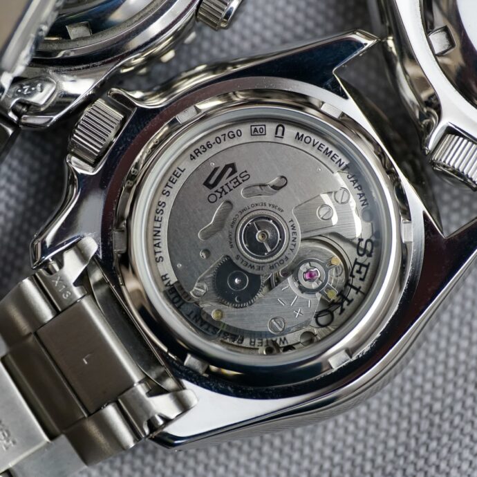 Каква е разликата между SII или TMI механизъм на Seiko
